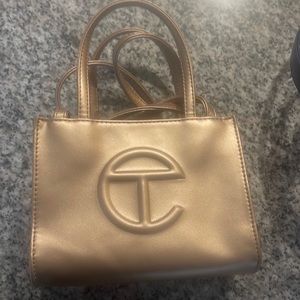 Champagne gold Automatic Telfar with dust bag small cross body strap